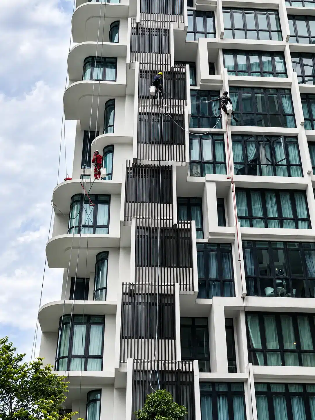 Rope access façade cleaning on a high-rise building